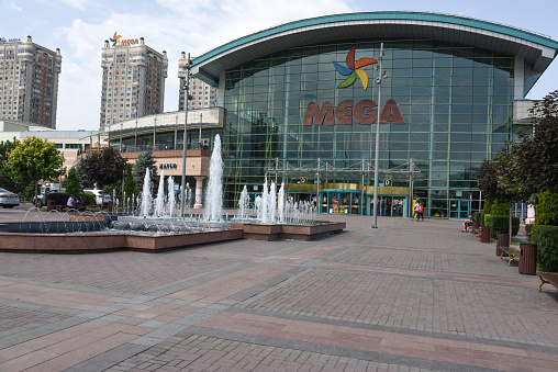 The Mega Center Almaty is a large Shopping Mall realized between 204 and 2006. The Mall includes arround 125 shops, cinemas and restaurants. The Image was captured during summer season.
