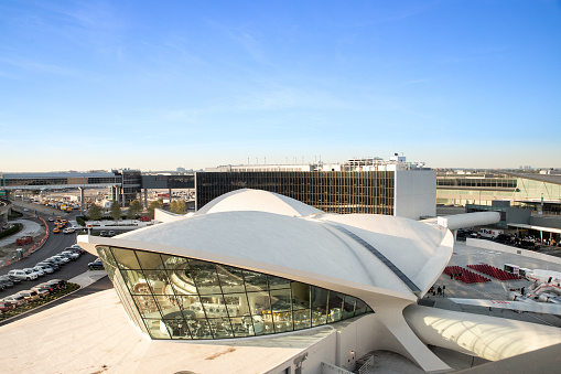 New York City, New York, USA - September 20, 2019:  View of historic TWA Hotel and surrounding area seen from John F. Kennedy Airport in Queens, New York on a sunny afternoon.