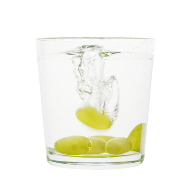 A glass of water and a splash