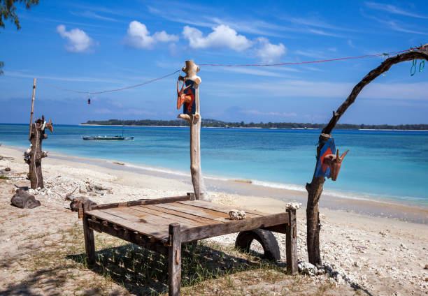istock Wooden beach lounger on the beach 1176203632
