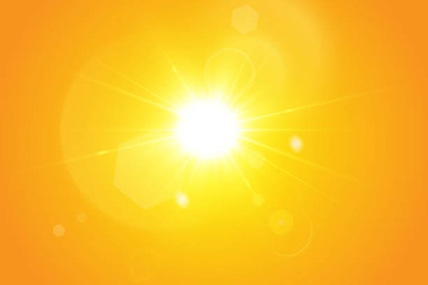 ciepłe słońce na żółtym tle. leto.bliki promienie słoneczne - blinding stock illustrations