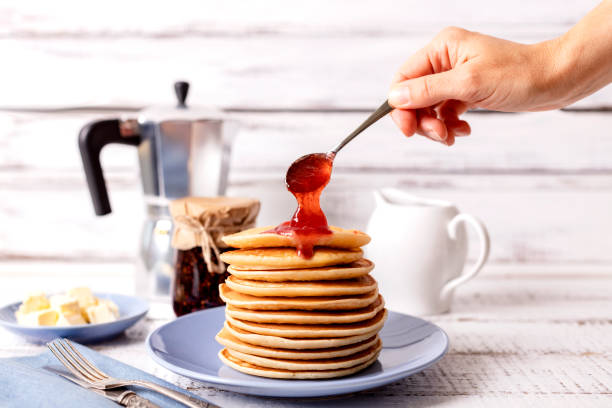 istock Tasty breakfast. Pancakes with strawberry jam and butter. 1176206119