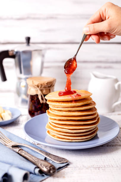 istock Tasty breakfast. Pancakes with strawberry jam and butter. 1176206645
