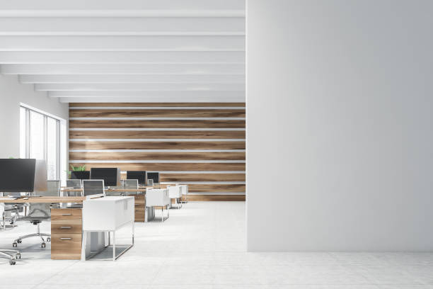 istock Wooden open space office with mock up wall 1176208487