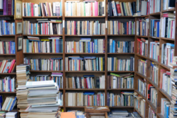 istock Blur image of bookshelf in bookstore. 1176208532