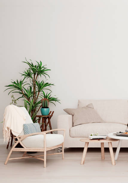 istock Mock up wall with beige white sofa, two tables and a chair in modern interior background, living room with large window an radiator, Scandinavian style, 3D render, 3D illustration 1176212669