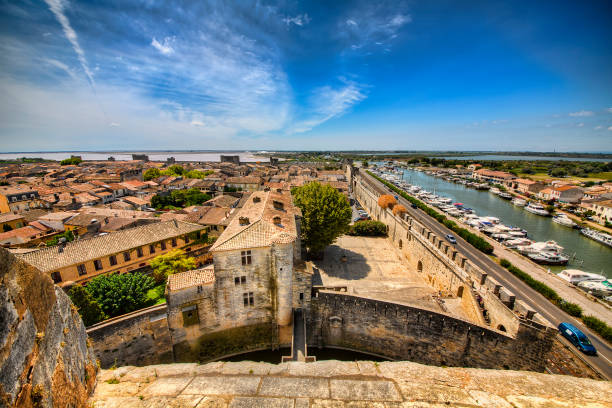 View from the Tower of Constance on the City Wall of Aigues-Mortes, Occitanie, France View from the Tower of Constance on the city wall of Aigues-Mortes, Occitanie, France fortified wall photos stock pictures, royalty-free photos & images