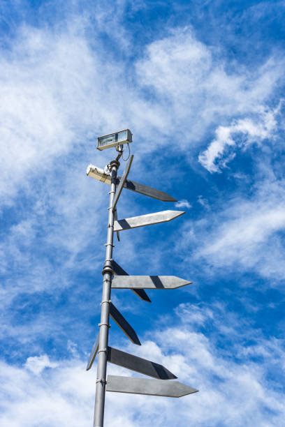 istock Blank directional road signs against blue sky. Directional sign post. 1176215346