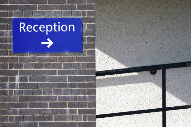 istock Reception direction arrow sign at office building entrance 1176220383