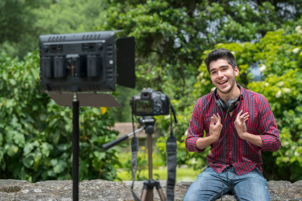 istock Teen recording video for video-sharing site 1176225013