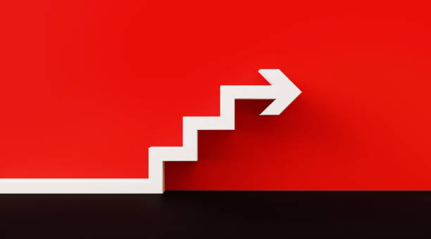 símbolo de flecha blanca sobre la pared roja - concepto de escalera de éxito - black ladder white staircase fotografías e imágenes de stock