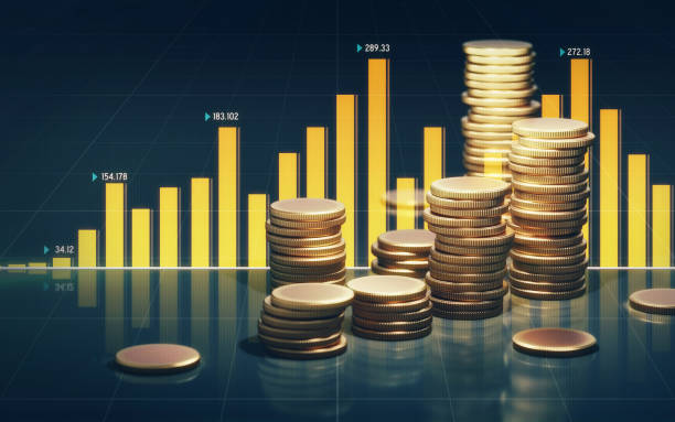 istock Coin Stacks and Yellow Bar Graph on Black Background 1176226006