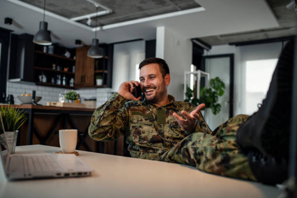 istock Army man with smart phone 1176228580