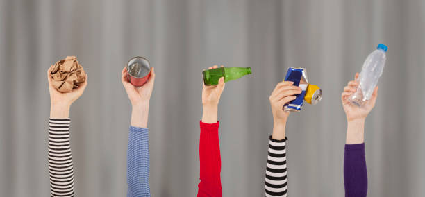 istock recycling concept hands up and holding garbage 1176232701