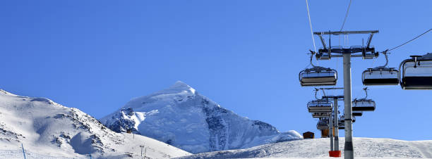 istock Ski-lift at ski resort in sun cold morning 1176237555