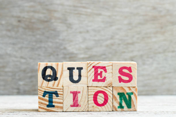 istock Letter block in word question on wood background 1176239822