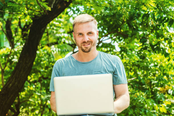 istock Young American Man with beard, working in New York City, 1176240579