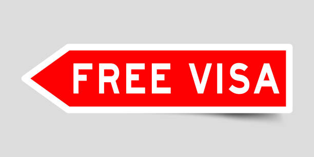 istock Arrow shape red color sticker in word free visa on gray background 1176242130