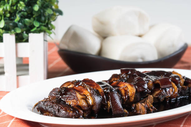 istock braised sweet soy pork belly with plain steamed buns 1176244982