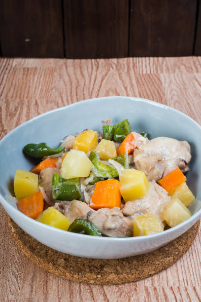 istock chicken pineapple coconut stew with green bell pepper and carrots 1176245163