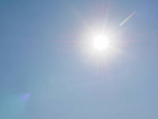 istock Bright sun and clear aternoon blue sky in a summer time 1176251996