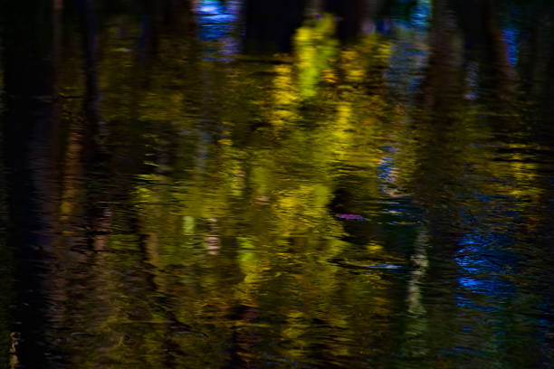 istock Autumn Colors Reflect on the Flowing Water 1176252920