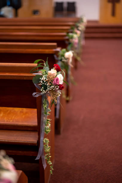 istock Wedding ceremony aisle flower decoration for church wedding 1176259748