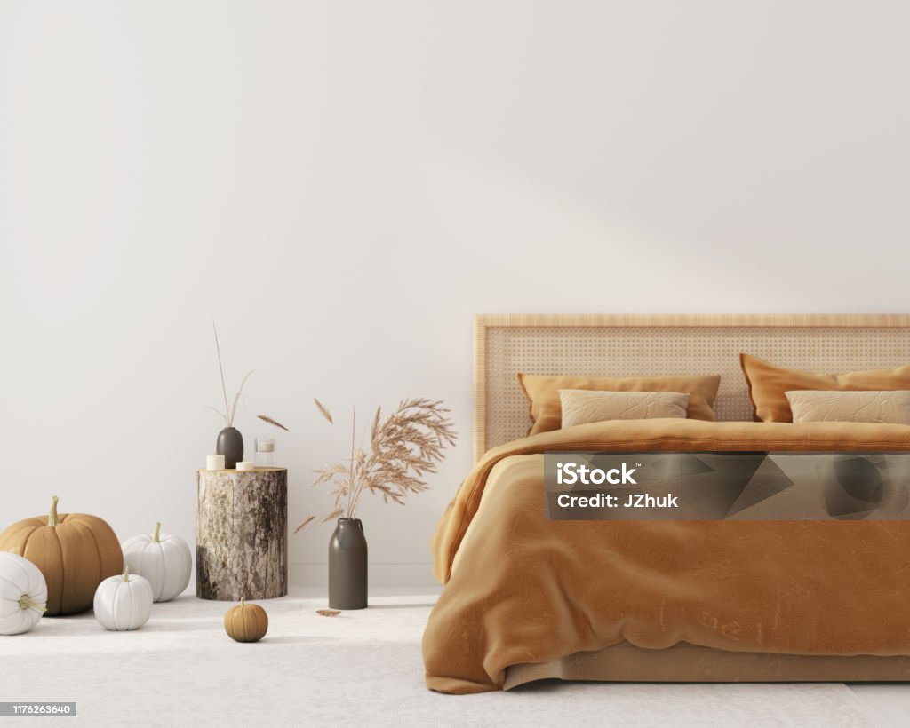 Bedroom interior  with autumn colored bedding  and decoration for Halloween Bedroom interior with King size bed with autumn colored bedding and a wicker rattan headboard, a bedside table made of stump and autumn pumpkin decorations. Interior decoration for Halloween/ 3D illustration, 3d render Autumn Stock Photo