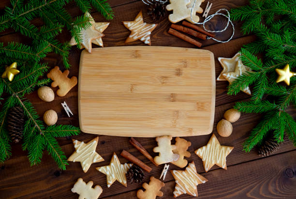 istock Christmas Cookies With Decorations On Wooden Table. 1176271296