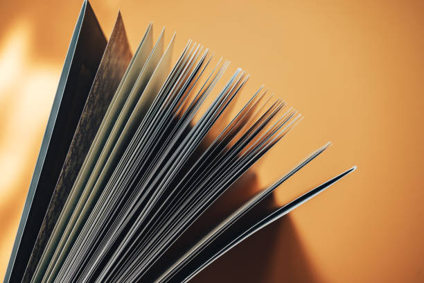 Close up Beautiful new book on a orange background. Top view.