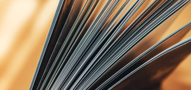 Close up Beautiful new book on a orange background. Top view.