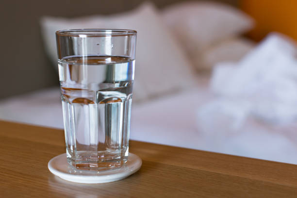 glass of water in the morning. - fast water imagens e fotografias de stock