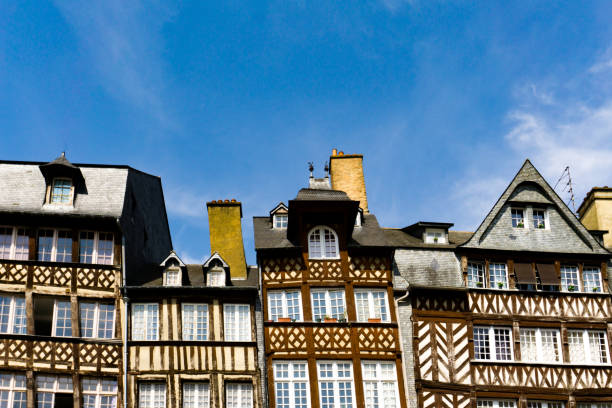 half-timbered houses on the Place des Lices Square in the historic old town of Rennes in Brittany Rennes, Ille-et-Vilaine / France - 26 August 2019: half-timbered houses at the Place des Lices Square in the historic old town of Rennes in Brittany rennes france photos stock pictures, royalty-free photos & images