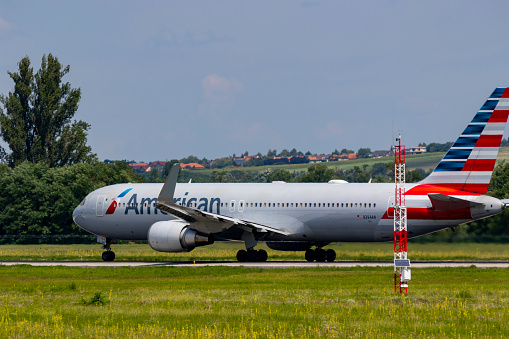 Budapest Hungary International Airport Aug 19, 2019: American Airline Boeing 767 just leaving from Budapest International airport.