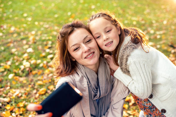 istock Happy family taking selfie 1176285684