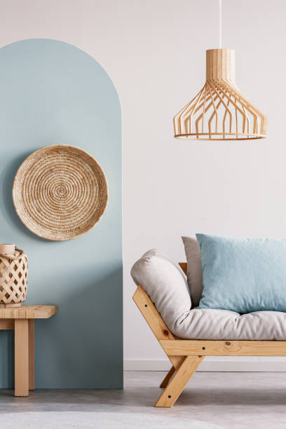 istock Trendy living room interior with white and blue wall and comfortable couch 1176285716