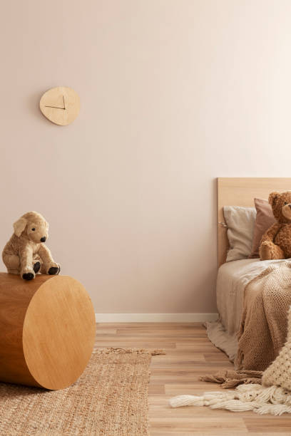 istock Copy space on empty wall of natural kid's bedroom 1176288827