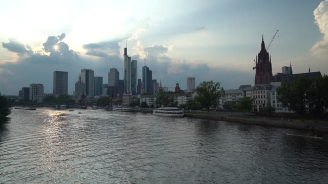 Urban skyline of Frankfurt am Main at dusk - 4k video