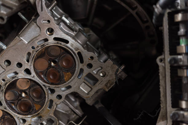 istock Disassembled car dirty engine cylinder at garage 1176293774