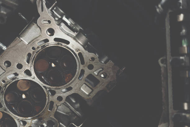 istock Disassembled car dirty engine cylinder at garage 1176293850