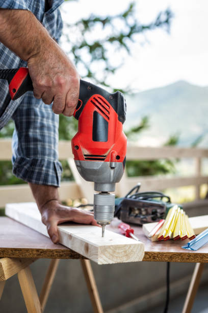 istock Craftsman at work on wooden boards. 1176294729