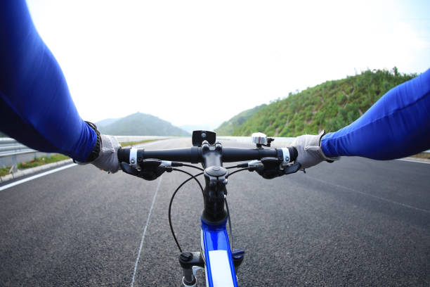 Cyclist riding a bike on highway