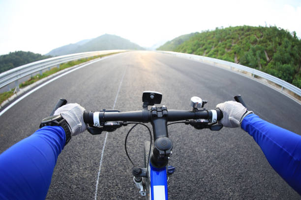 istock Cyclist riding a bike on highway 1176295894