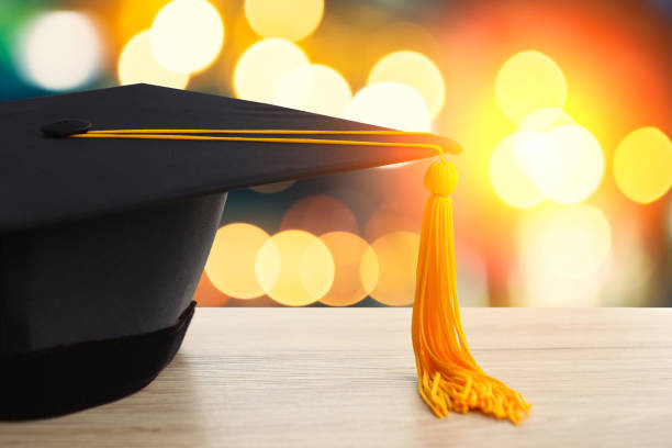 istock Black hat of university graduates with bokeh Blurred background 1176298920