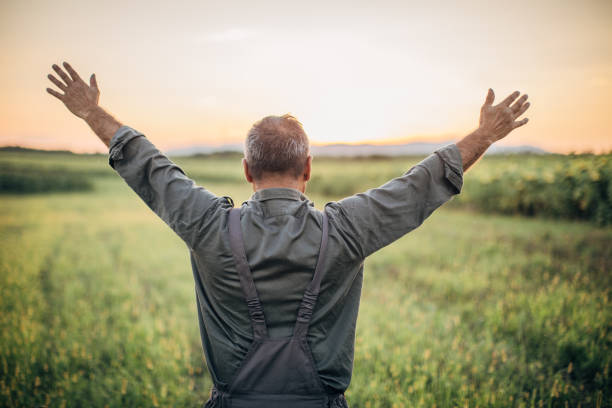 istock Farmer enjoys after harvest 1176302586