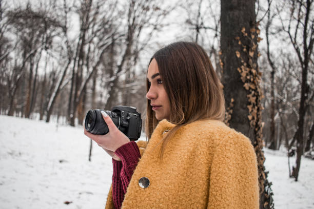 istock Pretty female photographer 1176303129