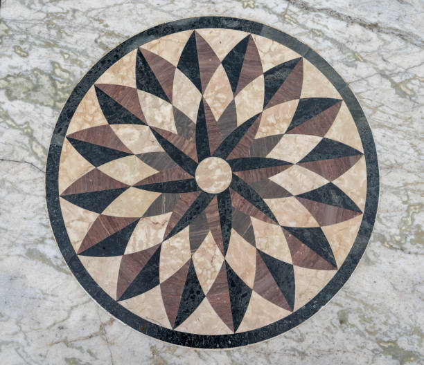 Mandala inlaid tile floor stock photo