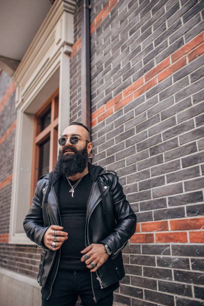istock Guy in black clothing portrait 1176306186