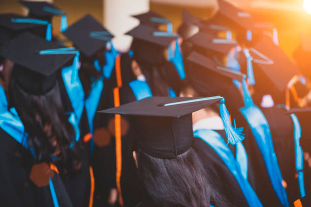 istock Graduates receive a certificate of graduation at the university. 1176307622