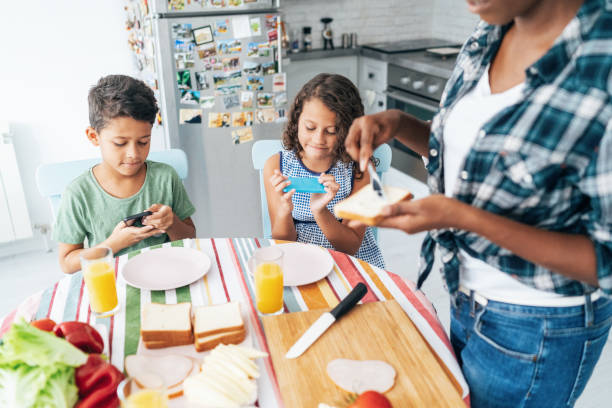 istock Modern family in the kitchen 1176310157